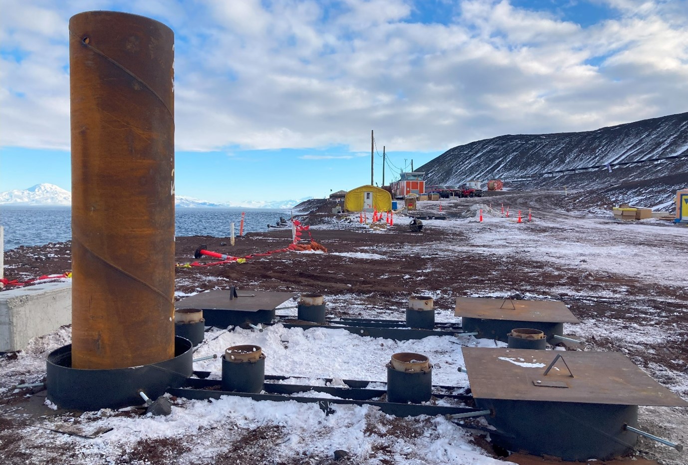 After Antarctica New Zealand completed drilling, the U.S. Naval Mobile Construction Battalion 3 began placing the piles in the wharf.